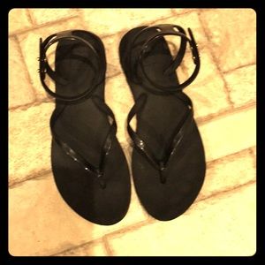 Reef ankle strap style black flip flops
